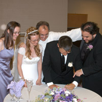 Luke and Heather Signing License